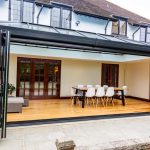 A {house} with a {patio} and a {glass door} in Westbury-On Severn.